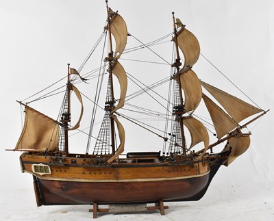 Lot 217 - A wooden model ship 'HMS Bounty', height...