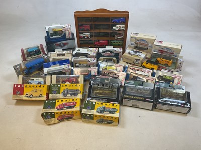 Lot 86 - A collection of boxed die cast vehicles.