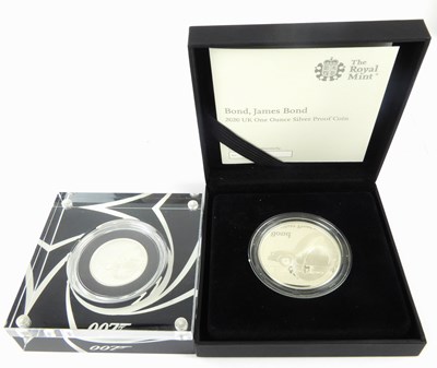 Lot 699 - THE ROYAL MINT; two James Bond silver coins,...