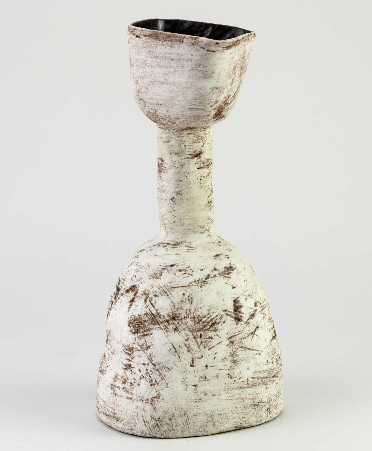 Lot 739 - SUSAN DISLEY; a stoneware bottle form covered...