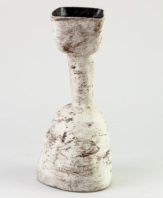 Lot 739 - SUSAN DISLEY; a stoneware bottle form covered...