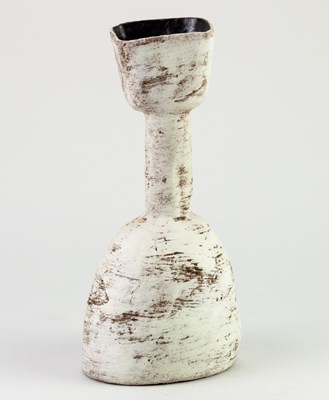 Lot 739 - SUSAN DISLEY; a stoneware bottle form covered...