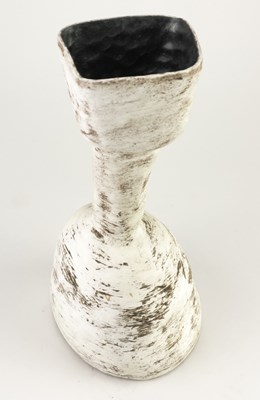 Lot 739 - SUSAN DISLEY; a stoneware bottle form covered...