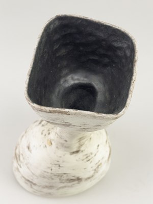 Lot 739 - SUSAN DISLEY; a stoneware bottle form covered...