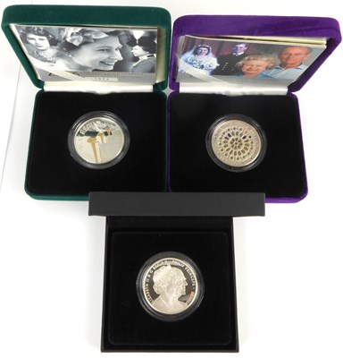 Lot 702 - THE ROYAL MINT; three royal commemorative...