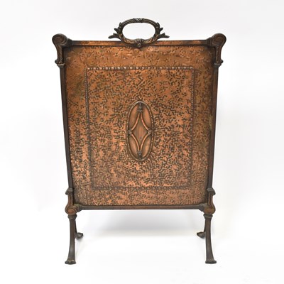 Lot 5 - An early 20th century brass fire screen with...