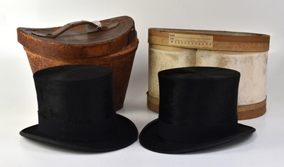 Lot 206 - Two Edwardian boxed top hats, one in original...