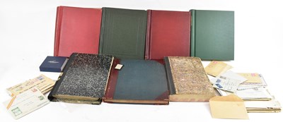 Lot 331 - Three old ledgers and four albums of all world...