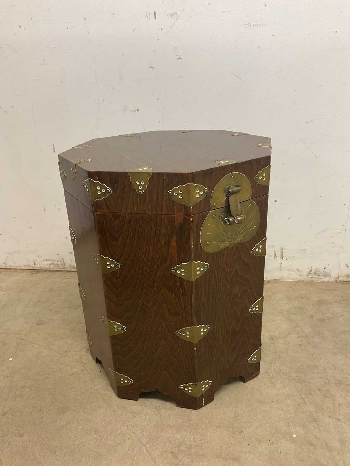 Lot 248 - A contemporary Korean elm octagonal brass...