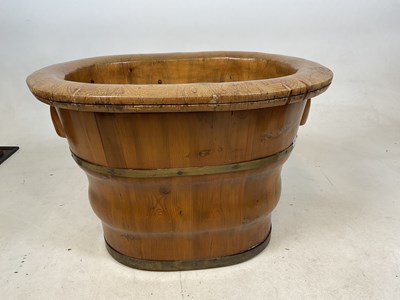 Lot 587 - An unusual Oriental pine two sectioned bath...