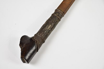 Lot 715 - An ethnic short sword with a distinct curve...