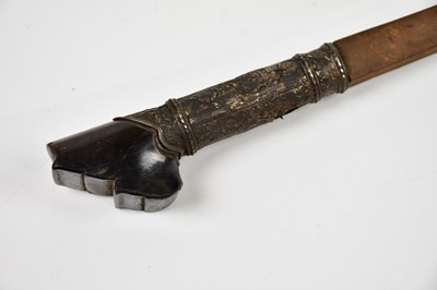 Lot 715 - An ethnic short sword with a distinct curve...