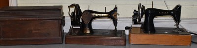 Lot 235 - Two Singer sewing machines (one cased) (2).