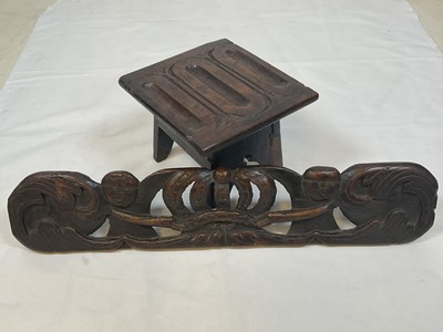 Lot 630 - An antique small oak stand and a carved oak...