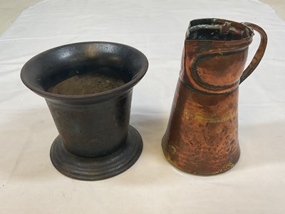 Lot 159 - A cast iron mortar, height 14cm and an Arts...