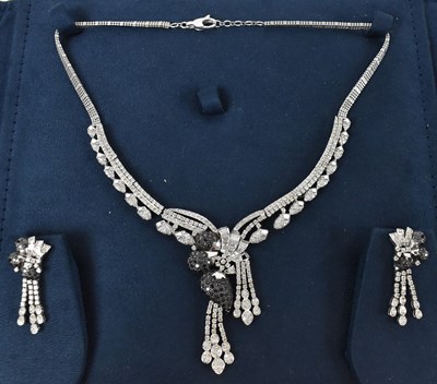 Lot 668 - An impressive Indian white metal and diamond...