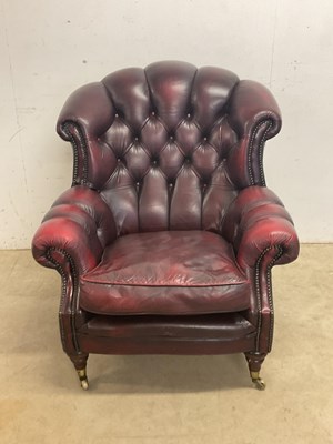 Lot 537 - A contemporary oxblood leather button...