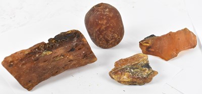 Lot 194 - Four large pieces of uncut amber.