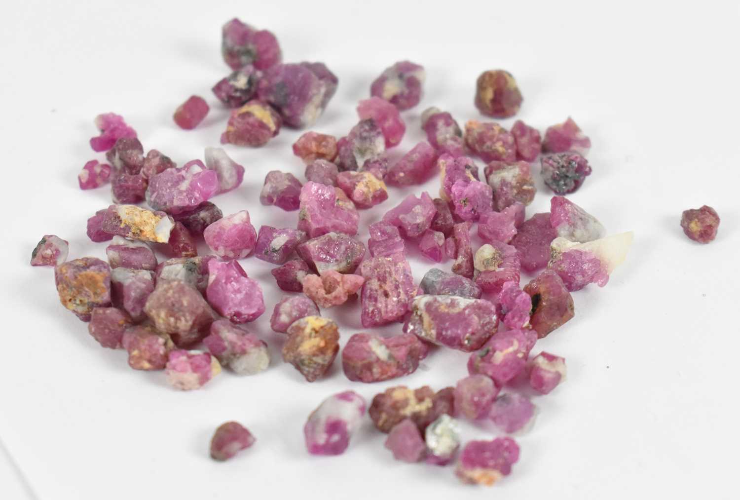 Lot 651 - A bag of unpolished rubies.