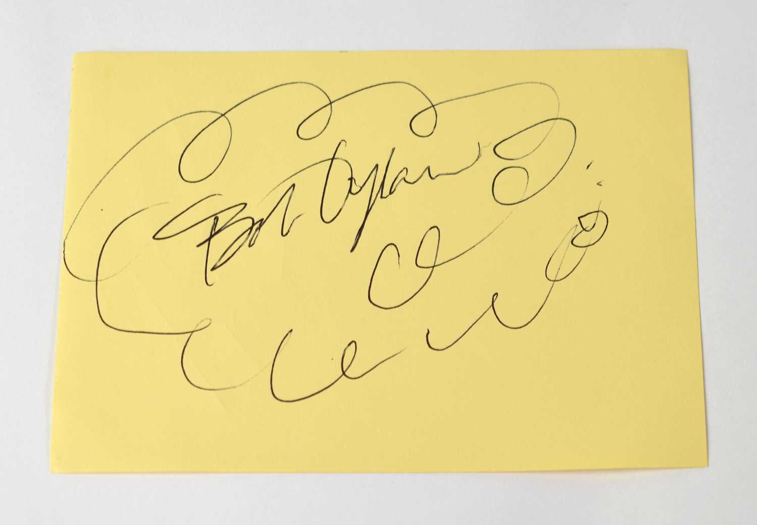 Lot 196 - BOB DYLAN; a torn page from an autograph