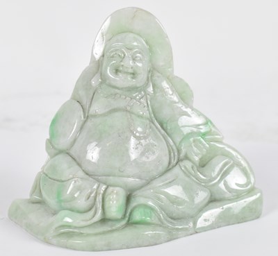 Lot 540 - A Chinese jade carving of a seated Buddha,...