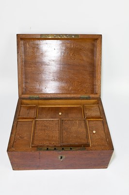 Lot 47 - A 19th century figured wood sewing box, with...