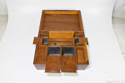 Lot 47 - A 19th century figured wood sewing box, with...