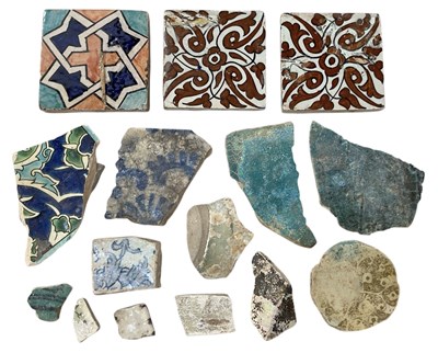 Lot 249 - A collection of ancient Eastern tile fragments.