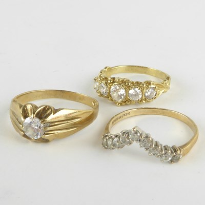 Lot 809 - Three 9ct gold dress rings with white stones,...