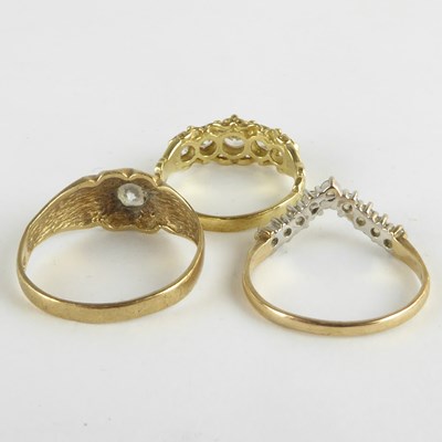 Lot 809 - Three 9ct gold dress rings with white stones,...