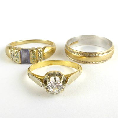 Lot 800 - An 18ct gold single white stone ring, marked...