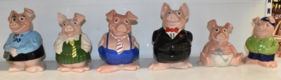 Lot 468 - WADE; a group of six Nat West piggy banks, to...