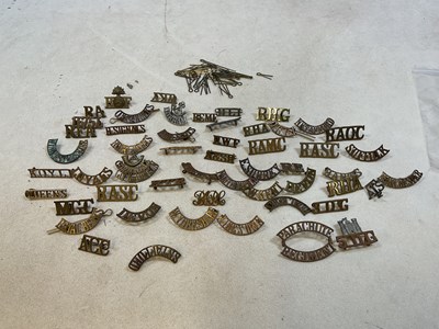 Lot 125 - A group of original military shoulder titles...