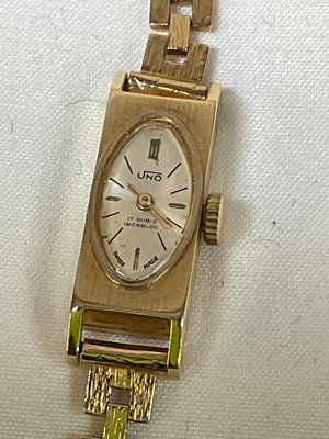 Lot 464 - UNO; a lady's vintage gold wristwatch with...