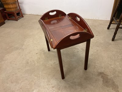 Lot 638 - A reproduction mahogany butler's tray on stand...