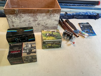 Lot 133 - A quantity of fishing rods and tackle, knives,...