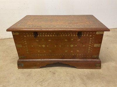 Lot 583 - A brass inlaid Bangladeshi hardwood...