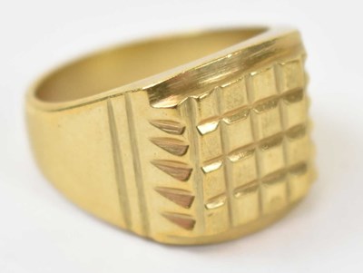 Lot 795 - A yellow metal gentlemen's ring, stamped 18k,...