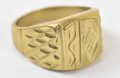 Lot 794 - A yellow metal gentlemen's ring, stamped 18k,...