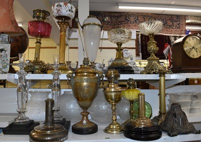 Lot 86 - A collection of oil lamps and parts, to...