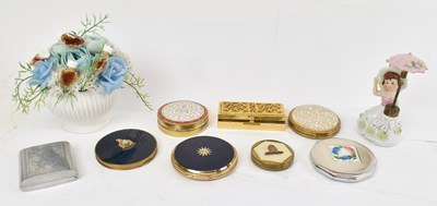 Lot 255 - A group of vintage compacts and perfumes.