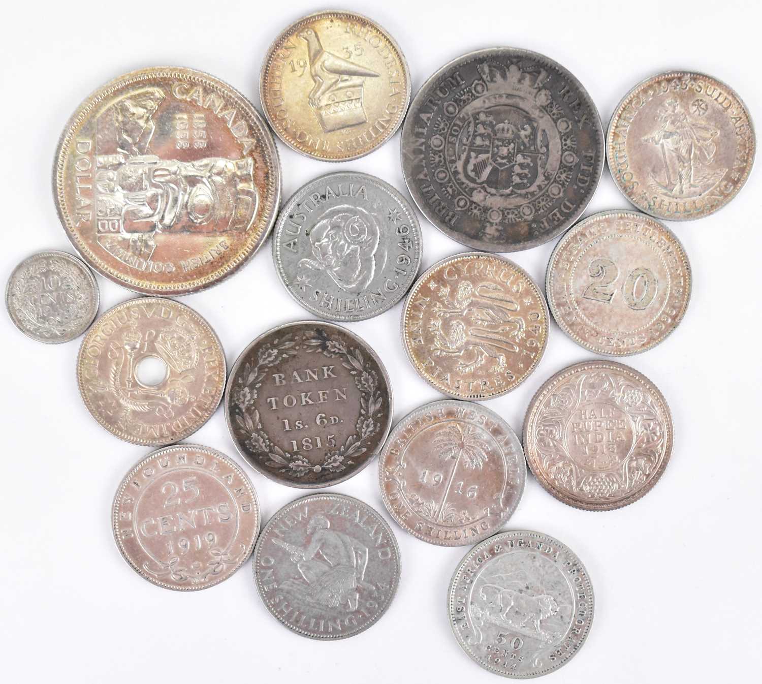 Lot 677 - Various world silver coins to include 1935...