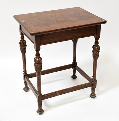 Lot 53 - An early 20th century oak occasional table...