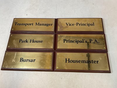 Lot 35 - Six engraved brass plaques on wooden plinths,...