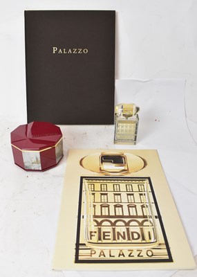 Lot 248 - FENDI; a Pallazo perfume set cased with books...