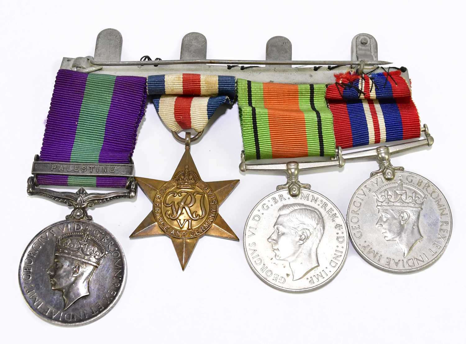 Lot 494 - Four WWII medals comprising George VI General...