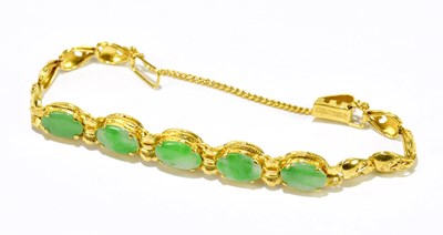 Lot 172A - A Chinese yellow metal and jade bracelet set...