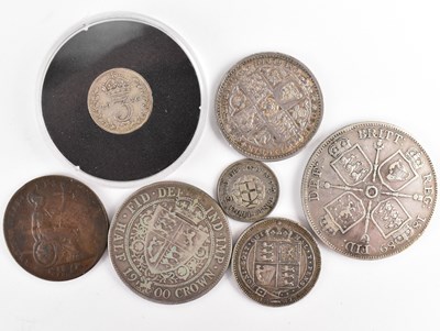 Lot 642 - Seven United Kingdom silver and other coins,...