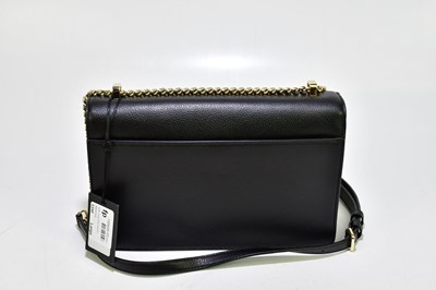 Lot 672 - DKNY; an unused with original tags black...