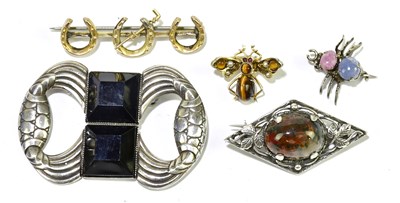 Lot 309 - A group of five brooches, including one...
